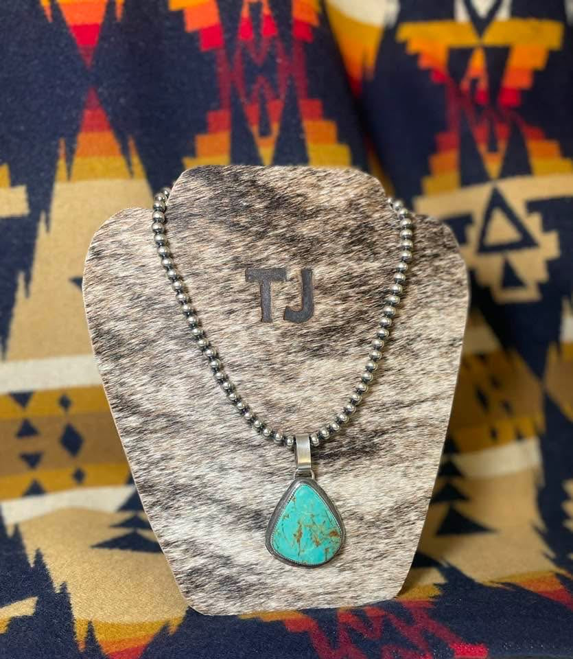Turquoise Mountain pendant on 6 mm Navajo pearls