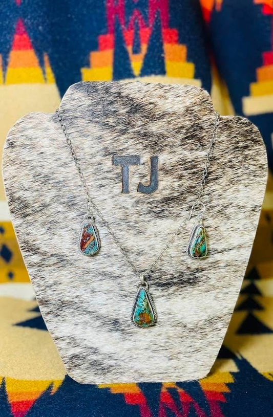 Alacran turquoise pendant and matching earrings